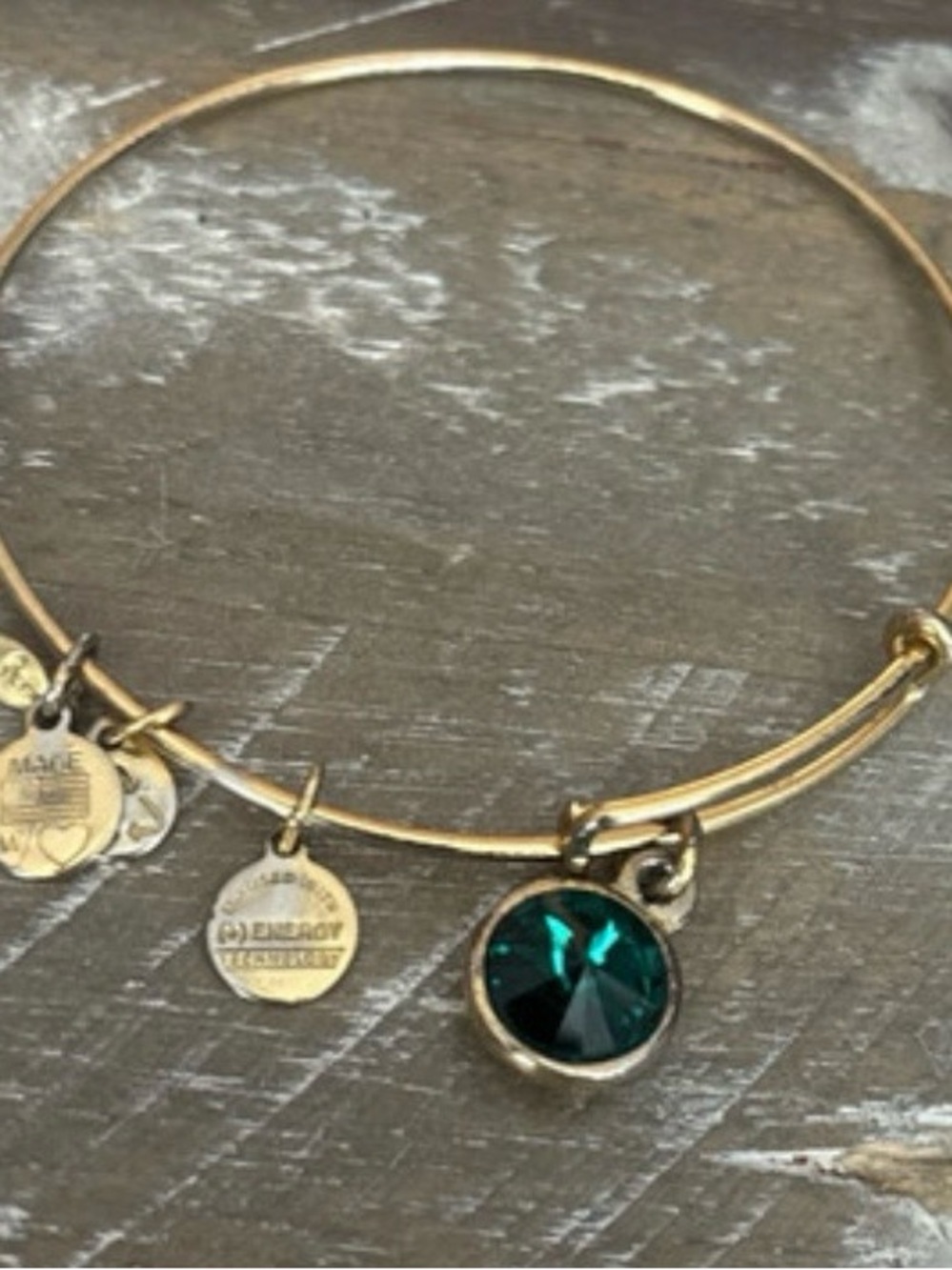 Gold Tone Bangle Bracelet with Emerald Green Crystal Charm